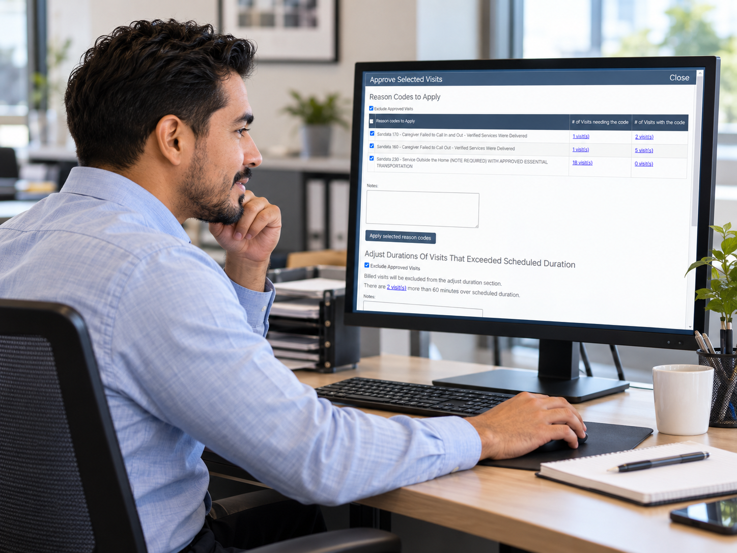 Office worker looking at Ankota screen